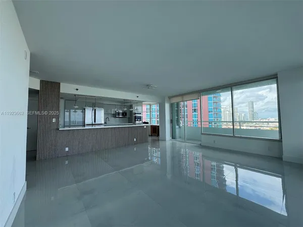 an empty room with windows