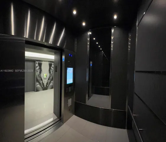 an aerial view of residential houses with outdoor space and street view