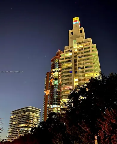 a view of a city with tall buildings