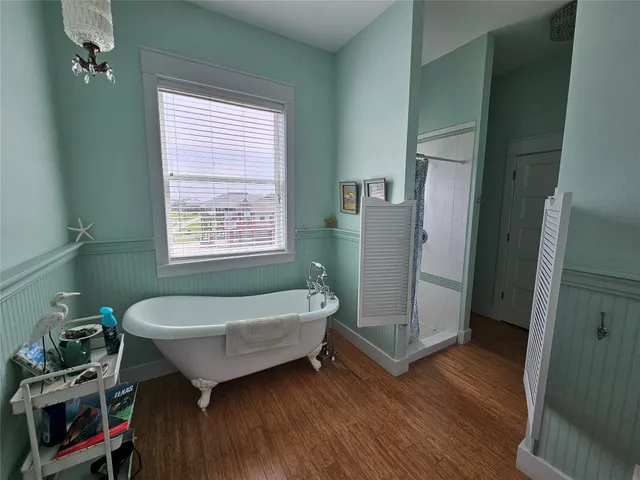 a bathroom with a sink a toilet and a bathtub