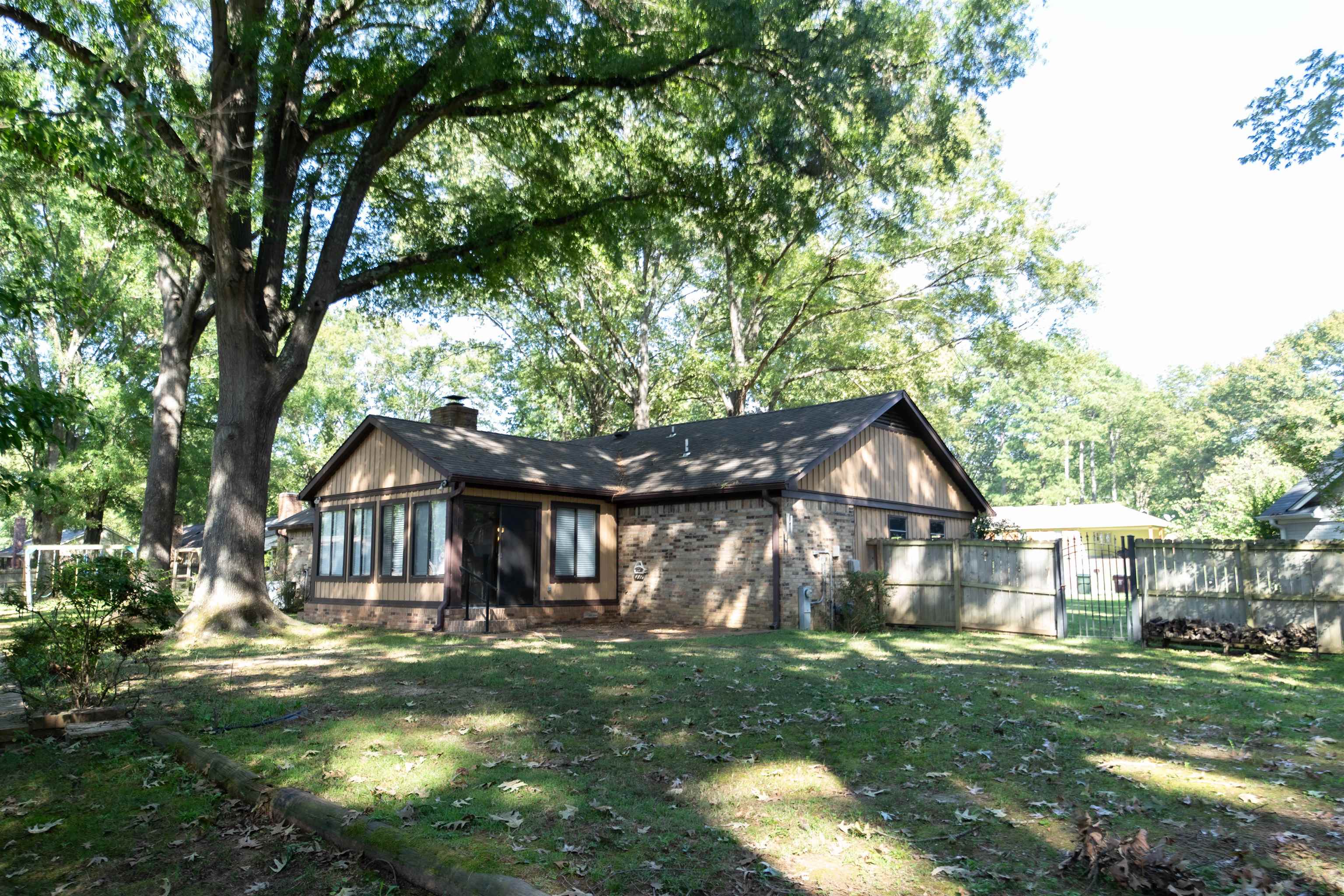 653 Oak Wild Cove Collierville, TN 38017 - Photo 3 of 20 Exterior space featuring a lawn