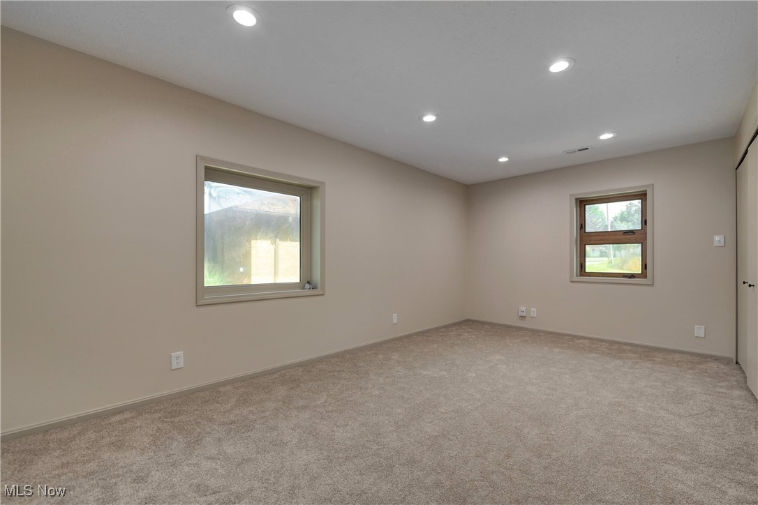 433 Chestnut Road Independence, OH 44131 - Photo 35 of 50 Empty room featuring recessed lighting and carpet floors