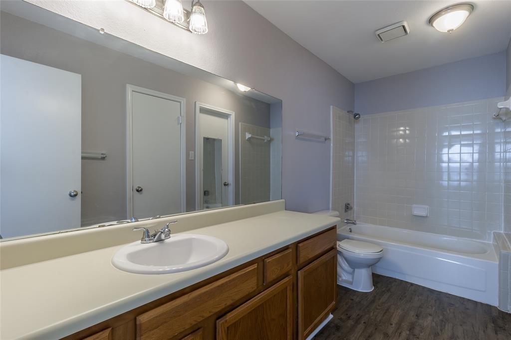 449 Harris Street, Unit 103C Coppell, TX 75019 - Photo 15 of 17 Full bathroom with oversized vanity