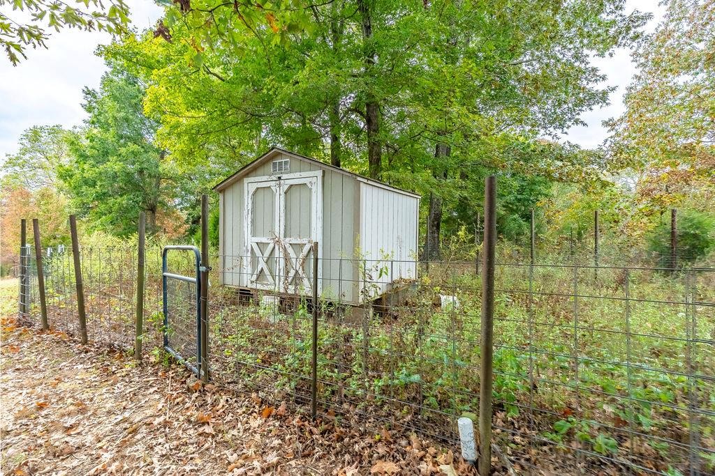 321 Archie Lane Dawson Springs, KY 42408 - Photo 34 of 42 a front view of a house with a yard