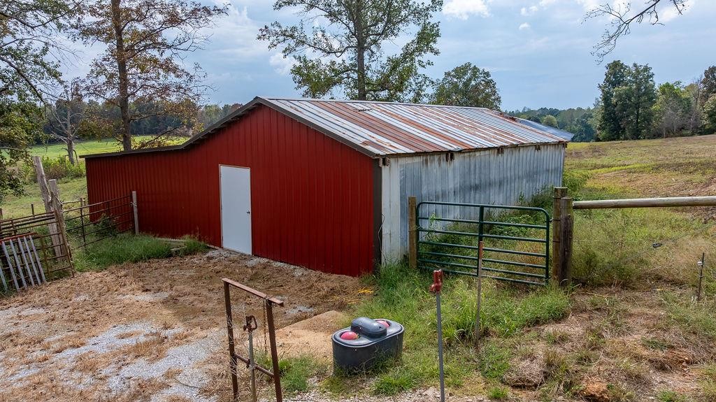321 Archie Lane Dawson Springs, KY 42408 - Photo 37 of 42 a backyard of a house with lots of green space