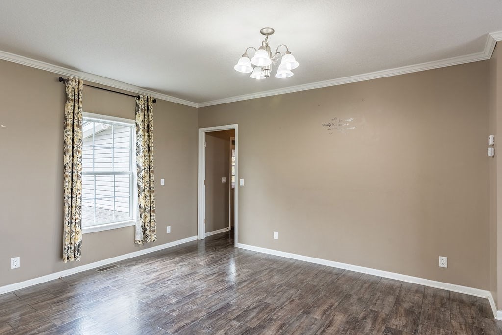 321 Archie Lane Dawson Springs, KY 42408 - Photo 9 of 42 a view of an empty room with a window