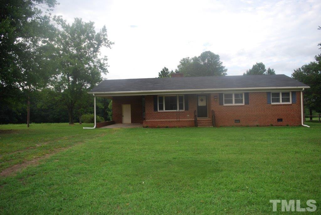 275 Tower Road Henderson, NC 27537 - Photo 1 of 10 Great brick ranch on 1 acre lot in private setting of several mini farms