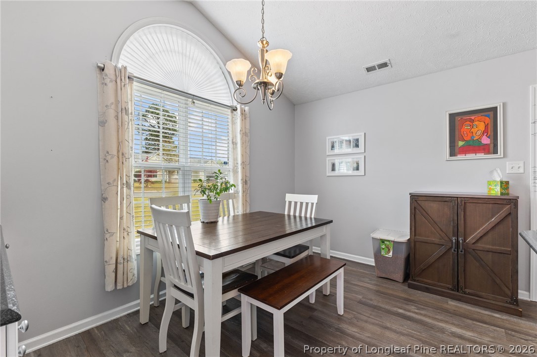 122 Raymond Street Raeford, NC 28376 - Photo 16 of 36 a dining room with furniture and window