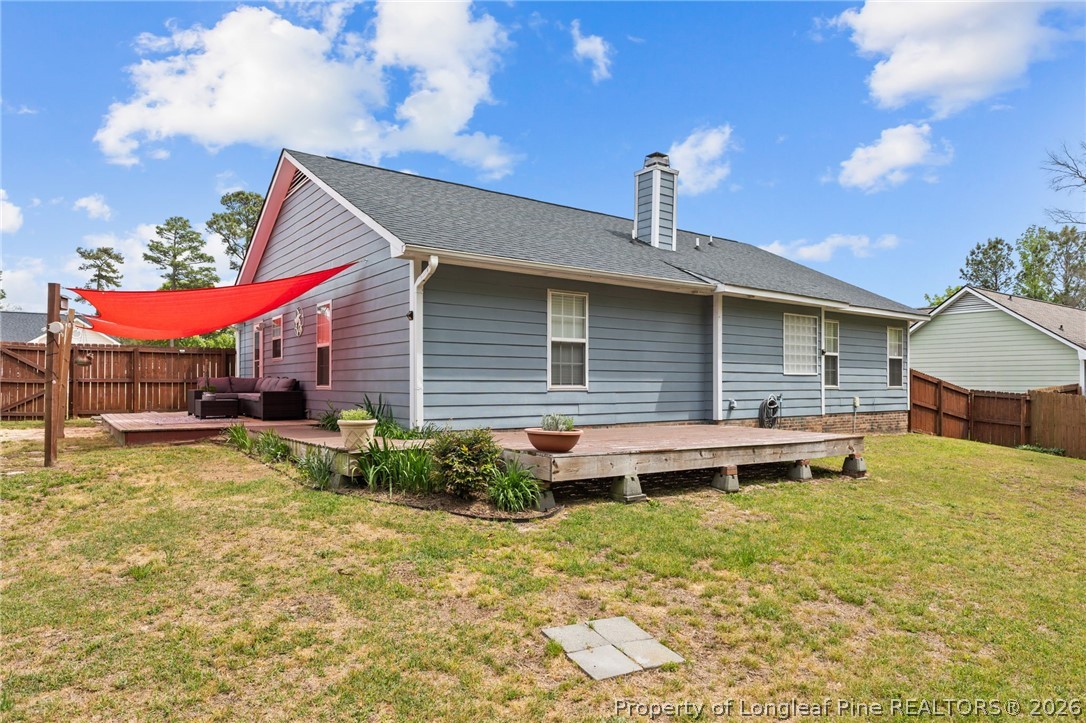 122 Raymond Street Raeford, NC 28376 - Photo 29 of 36 a view of a house with a yard
