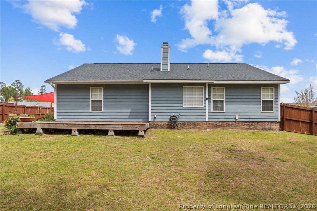 122 Raymond Street Raeford, NC 28376 - Photo 30 of 36 a front view of a house with a yard