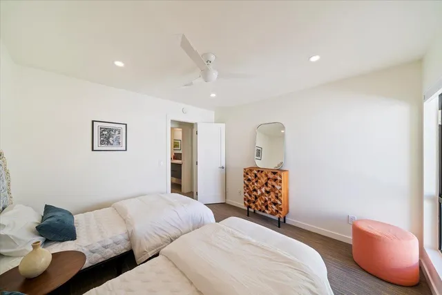 a bedroom with furniture and a couch