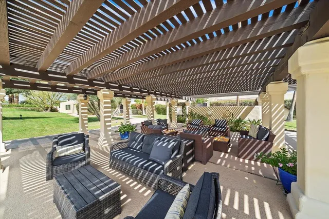 a view of a living room with furniture