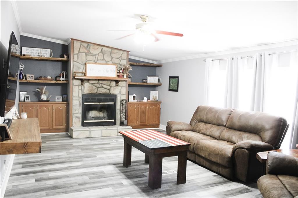 143 Lee Road Opelika, AL 36804 - Photo 23 of 61 Main living room w/woodburning FP (can also be gas-has gas hook up
