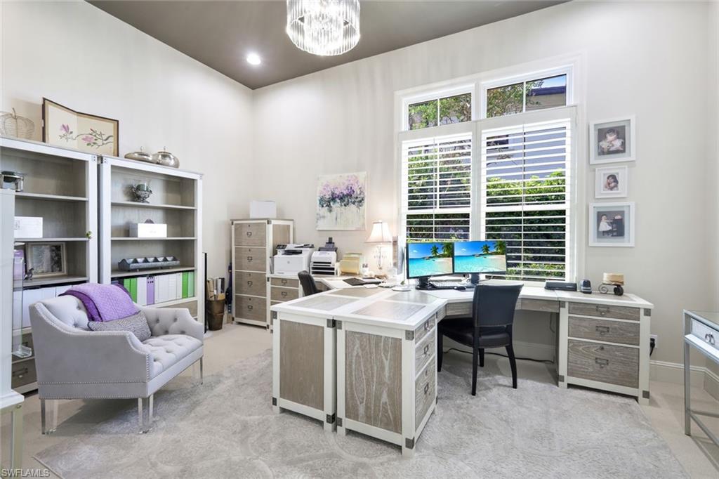16699 Pistoia Way Naples, FL 34110 - Photo 16 of 48 a view of a workspace with furniture and a window