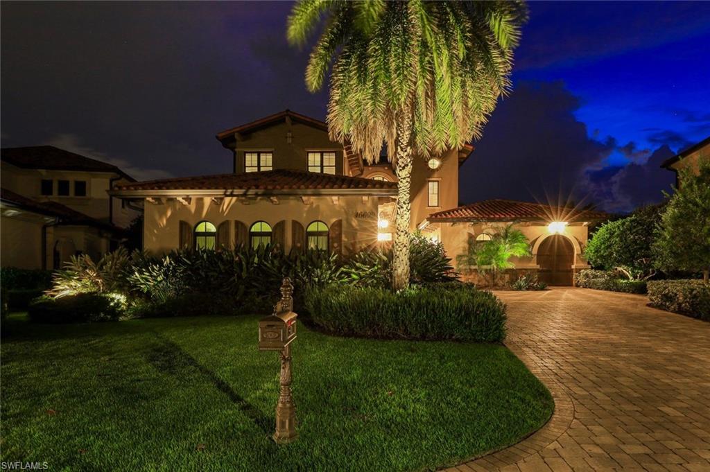 16699 Pistoia Way Naples, FL 34110 - Photo 45 of 48 a view of a yard in front of house