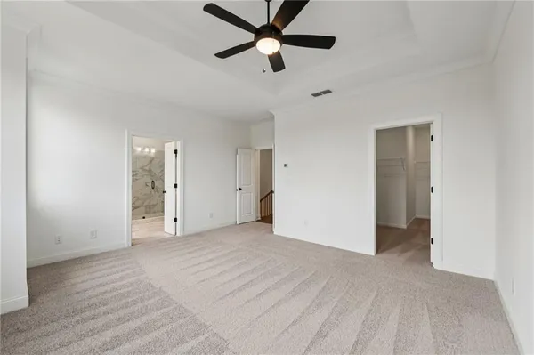 a view of an empty room and window