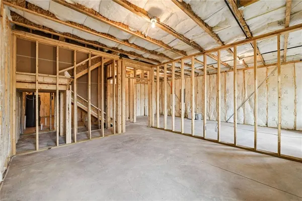 a view of a room with wooden walls