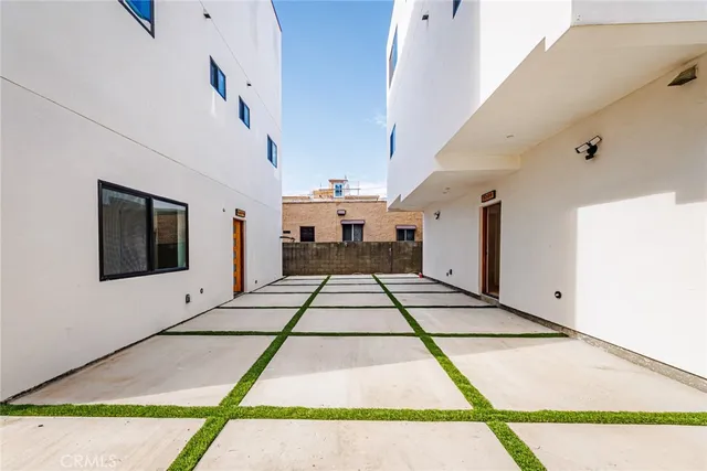 a view of a hallway with entryway