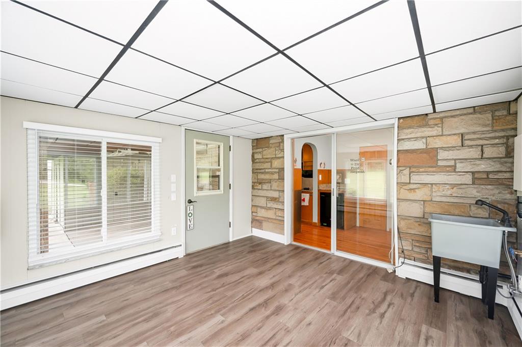120 West Sunbury Road Butler, PA 16001 - Photo 27 of 46 a view of a room with wooden floor and furniture