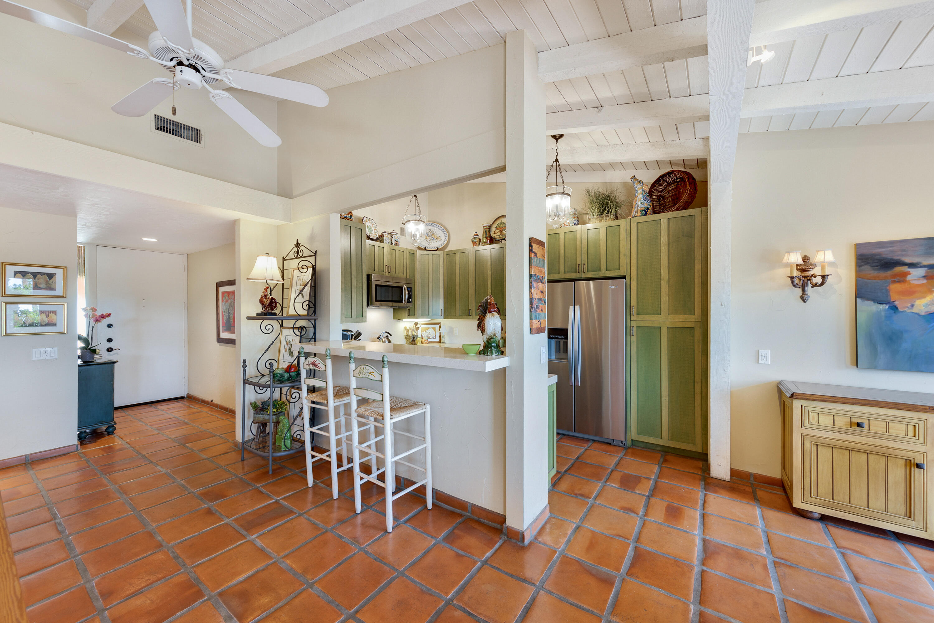 40162 Vía Del Oro Rancho Mirage, CA 92270 - Photo 15 of 34 a kitchen with stainless steel appliances a refrigerator and microwave