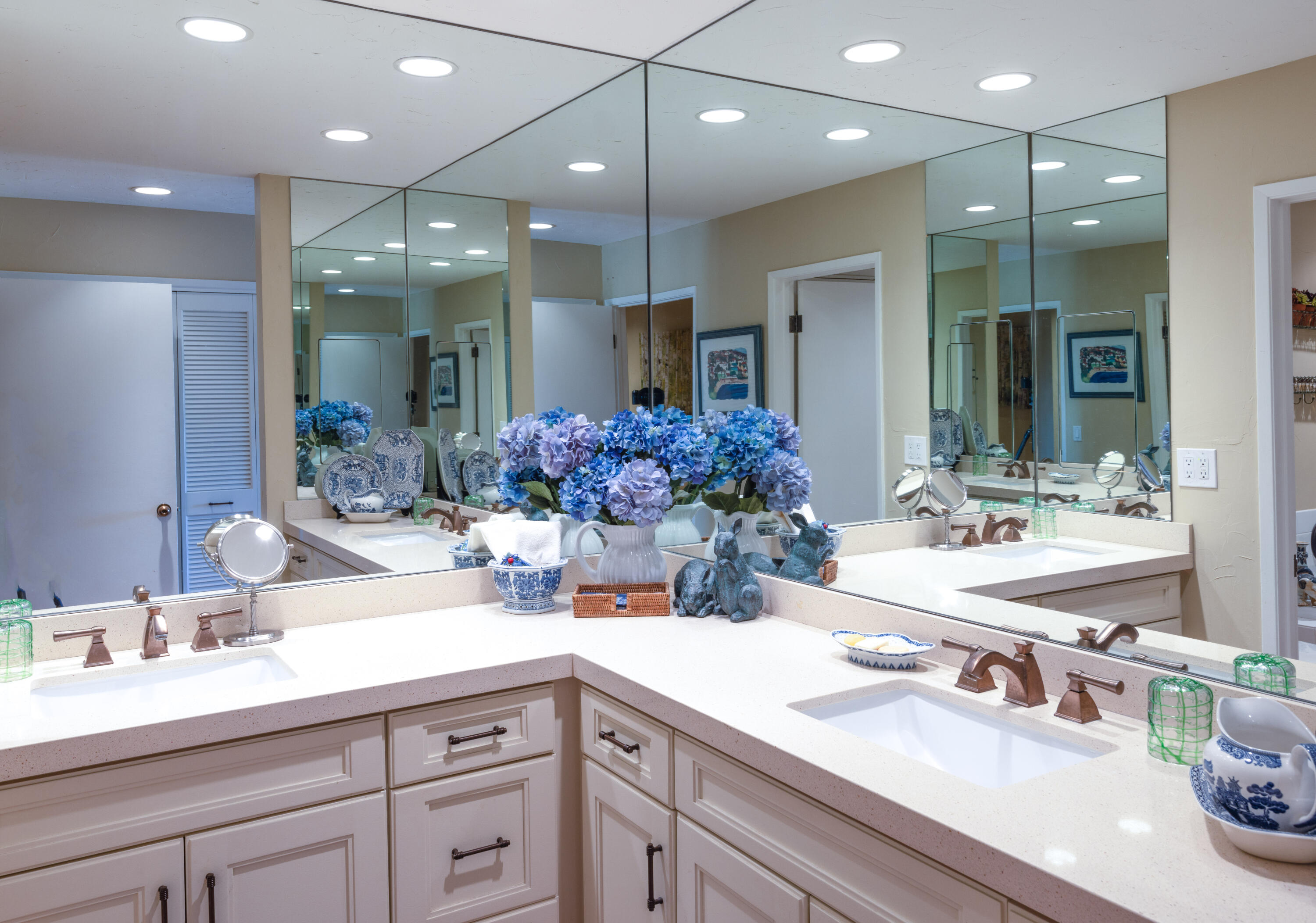 40162 Vía Del Oro Rancho Mirage, CA 92270 - Photo 19 of 34 a bathroom with double vanity sinks a vanity a mirror and shower