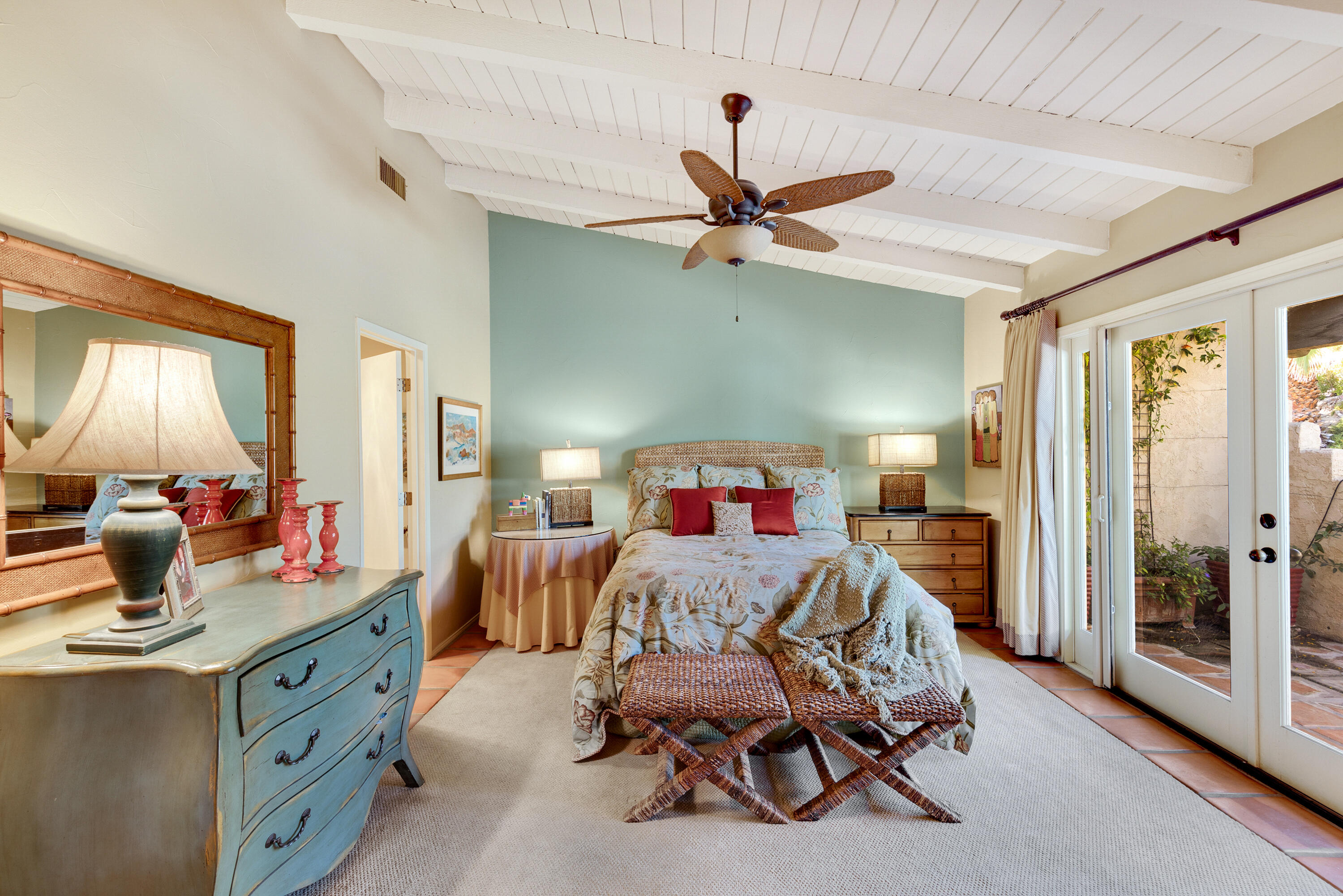 40162 Vía Del Oro Rancho Mirage, CA 92270 - Photo 21 of 34 a living room with furniture and a chandelier
