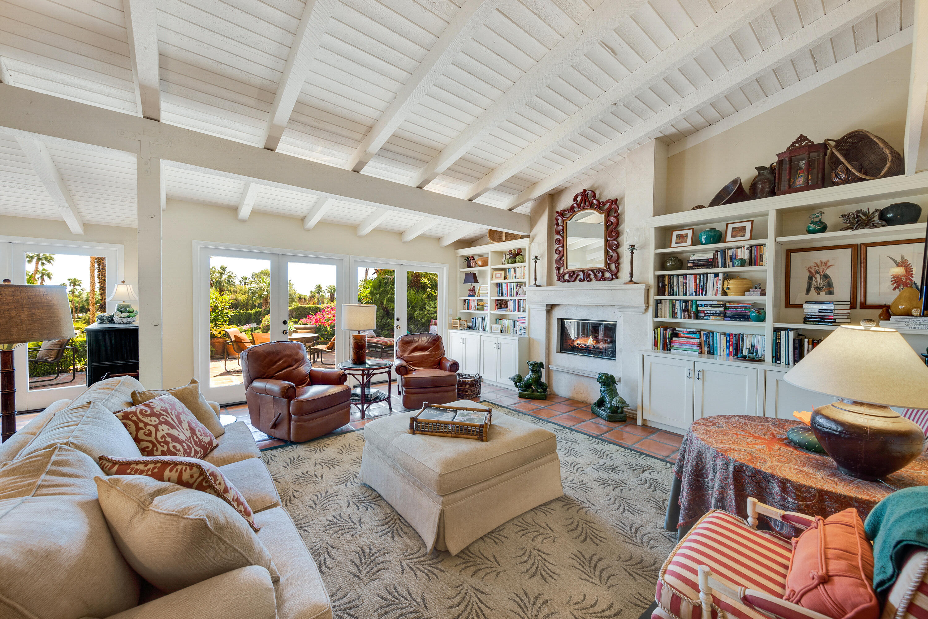 40162 Vía Del Oro Rancho Mirage, CA 92270 - Photo 6 of 34 a living room with furniture and a fireplace
