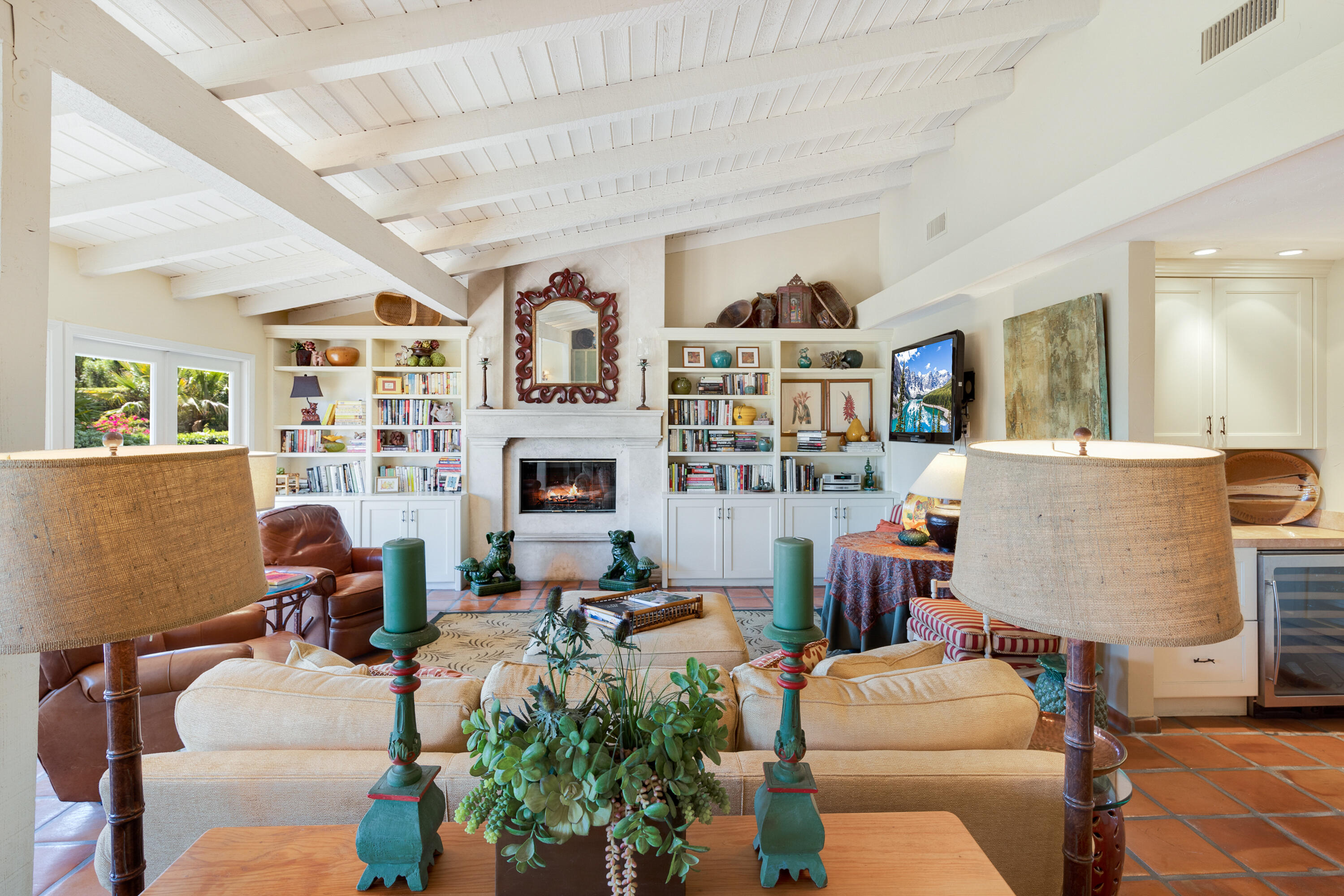 40162 Vía Del Oro Rancho Mirage, CA 92270 - Photo 10 of 34 a living room with furniture and a fireplace