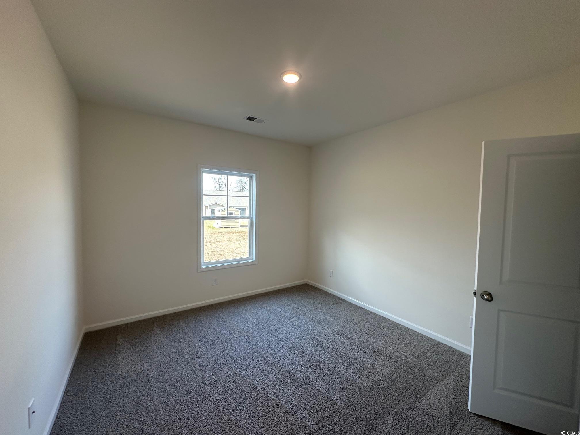 537 Honeyhill Loop Conway, SC 29526 - Photo 16 of 40 Spare room featuring baseboards, visible vents, an