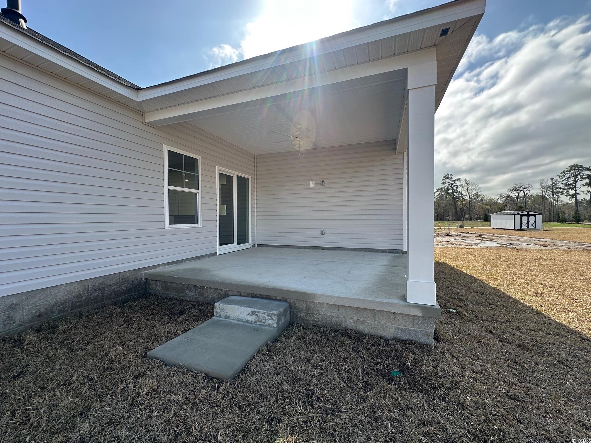 537 Honeyhill Loop Conway, SC 29526 - Photo 17 of 40 View of patio featuring a storage shed and an outd