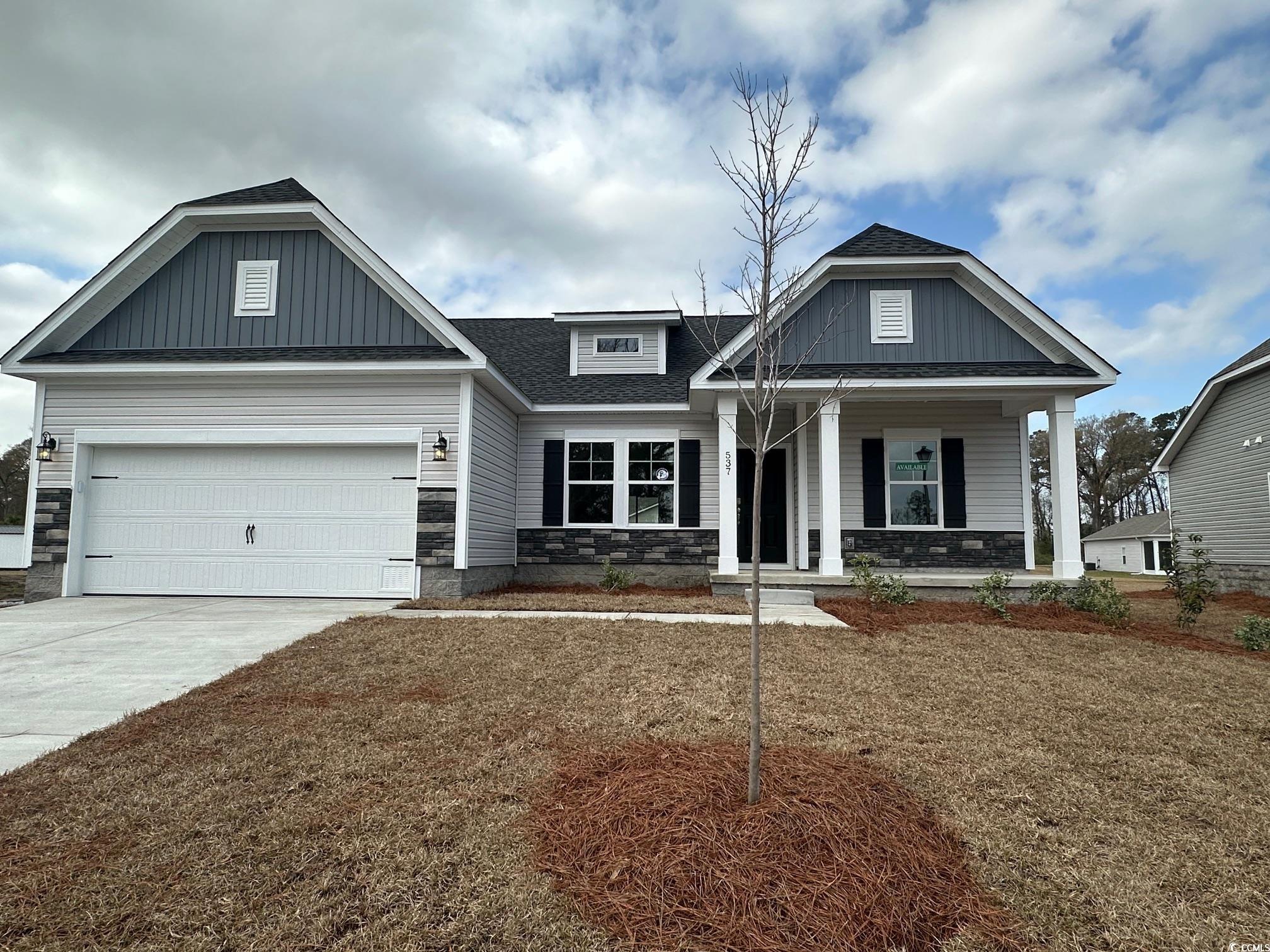 537 Honeyhill Loop Conway, SC 29526 - Photo 2 of 40 Craftsman house with driveway, stone siding, board