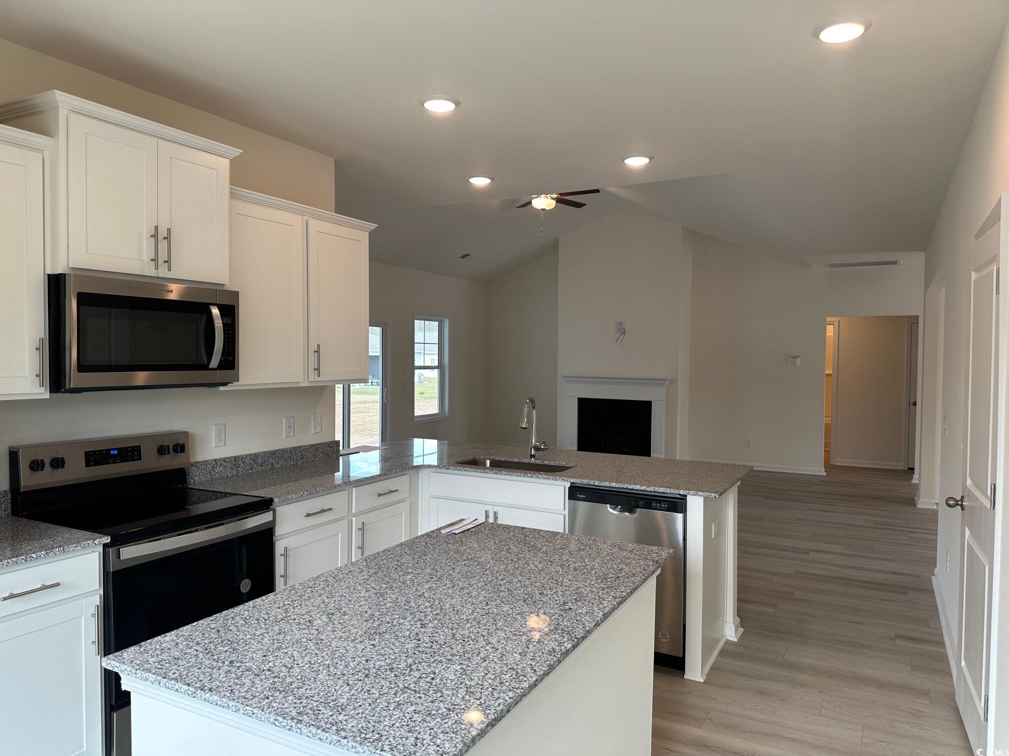 537 Honeyhill Loop Conway, SC 29526 - Photo 40 of 40 Kitchen with open floor plan, a peninsula, stainle