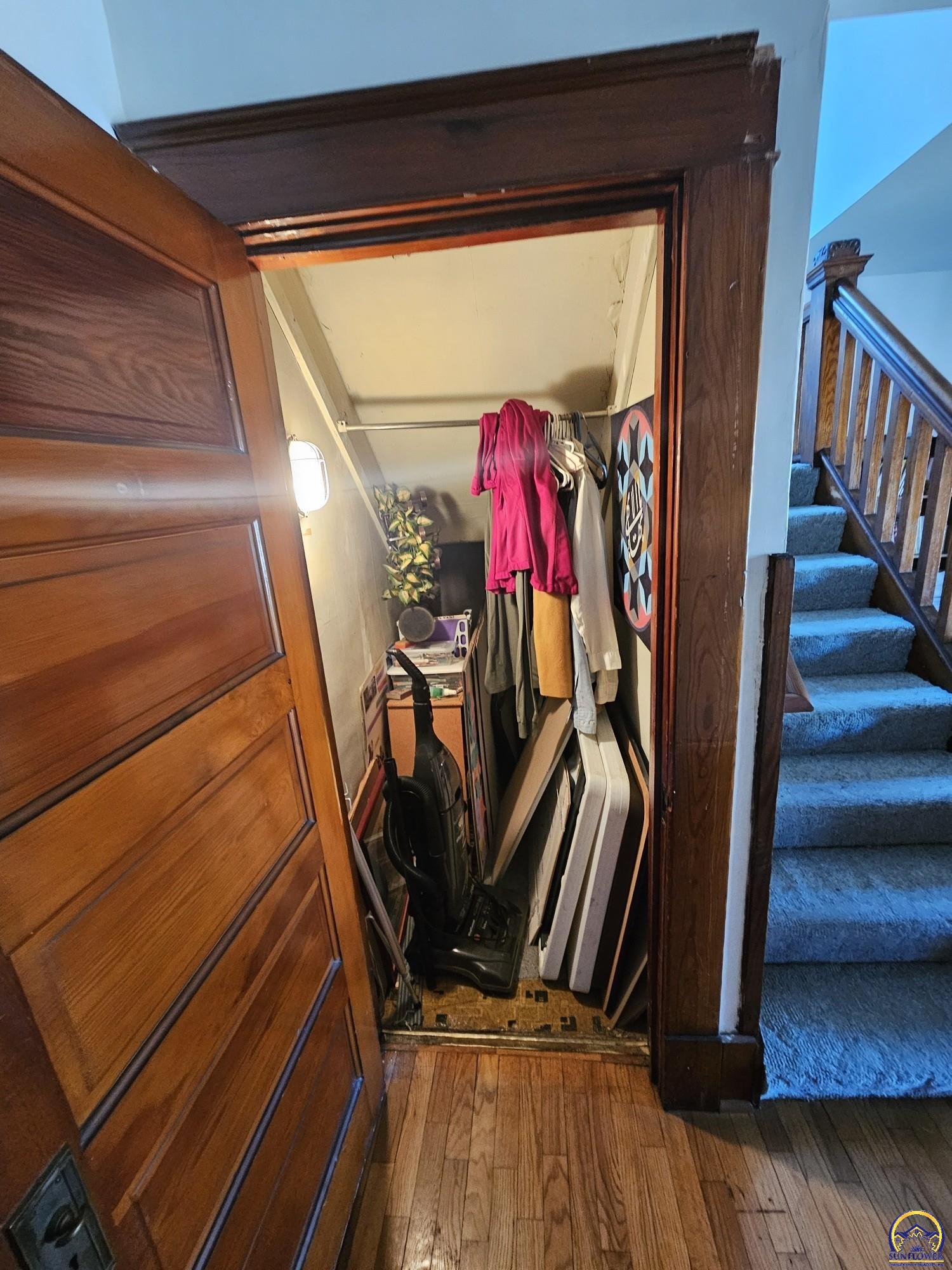 603 Southwest 8th Street Topeka, KS 66612 - Photo 10 of 24 closet under stairs