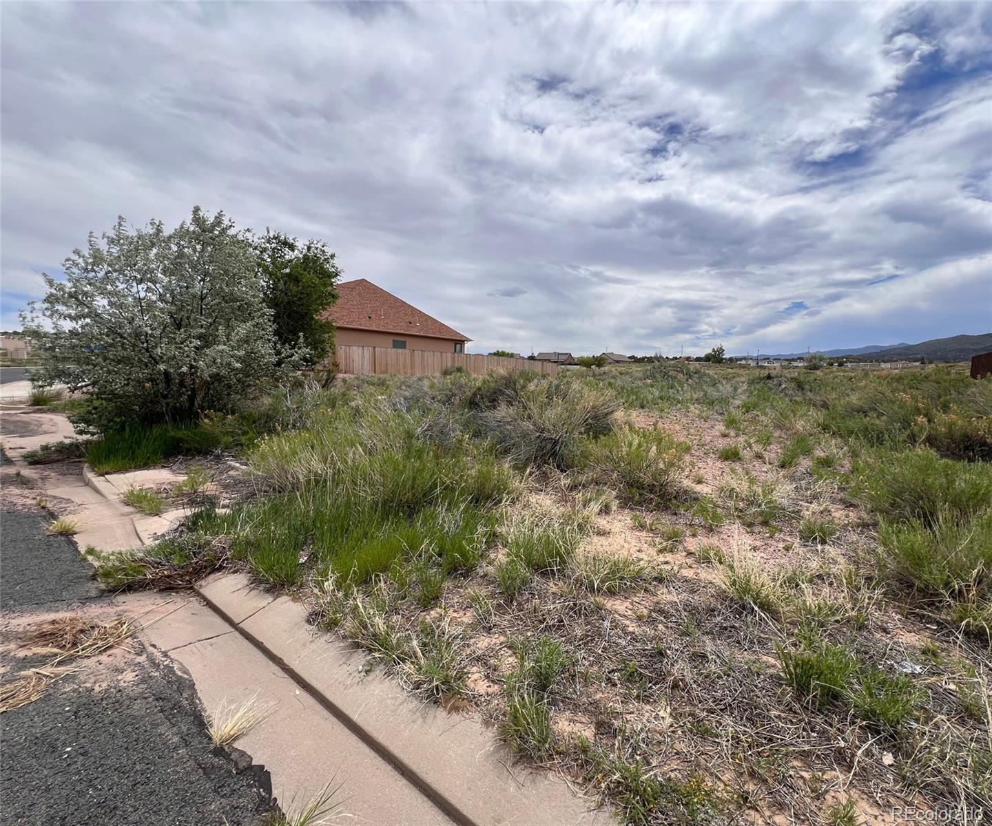 424 Empire Road Canon City, CO 81212 - Photo 3 of 6 a view of a yard with an outdoor space