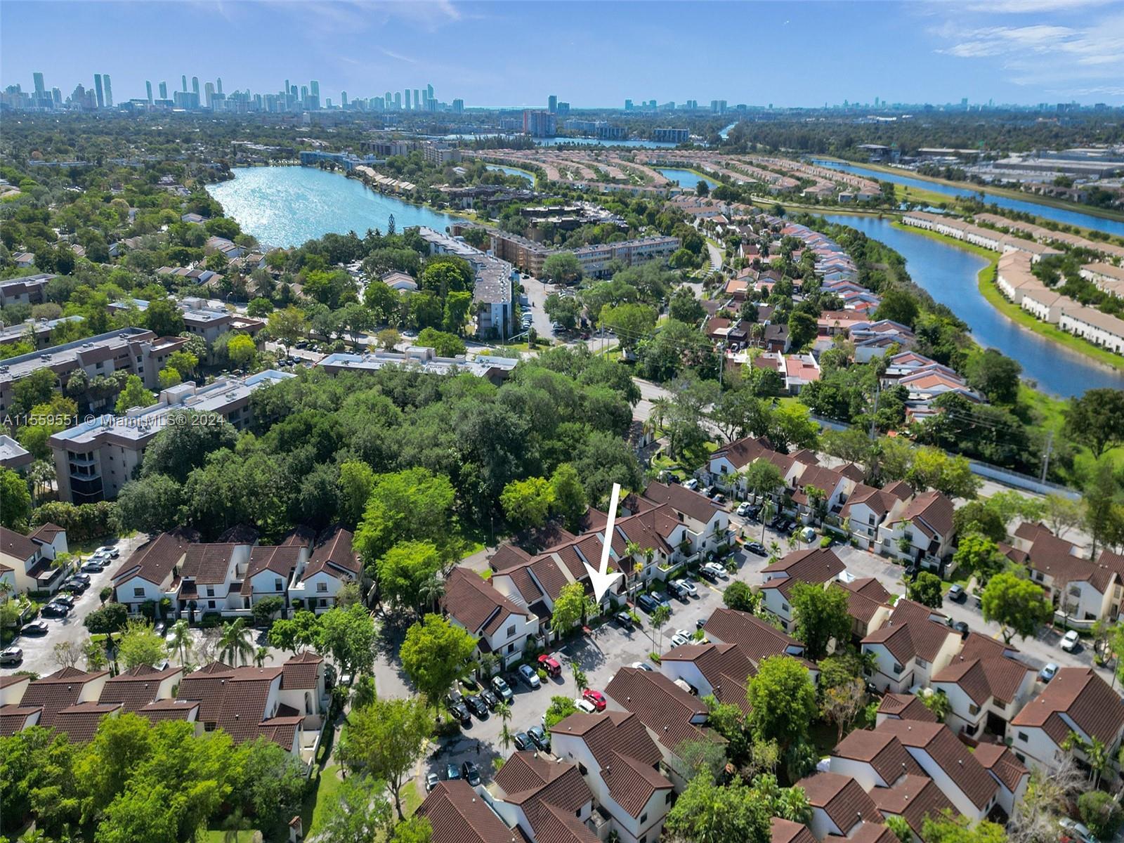 337 Ives Dairy Road, Unit 33704 Miami, FL 33179 - Photo 21 of 22 an aerial view of a city