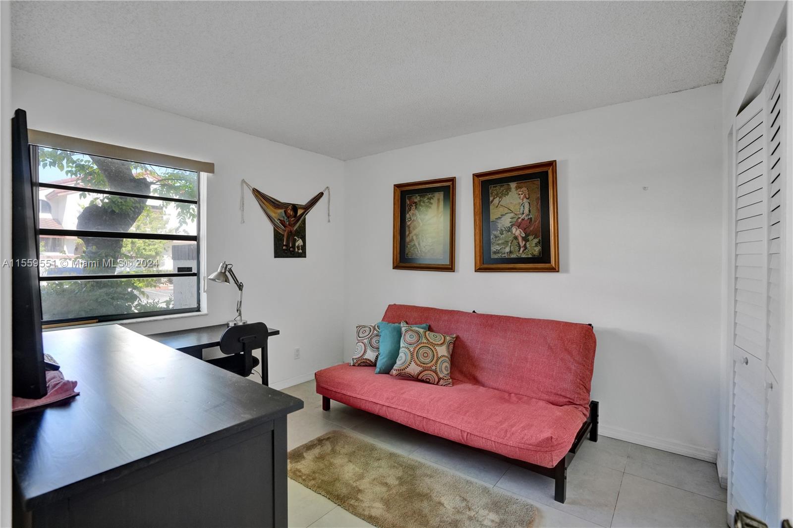 337 Ives Dairy Road, Unit 33704 Miami, FL 33179 - Photo 8 of 22 a living room with furniture