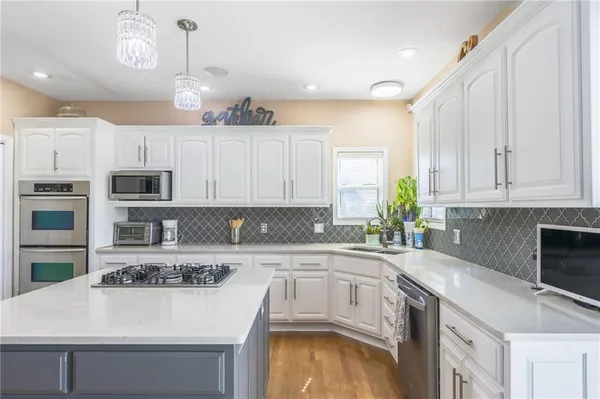 $545,000 | 8718 Ridgeway Court, Kansas City, MO 64138