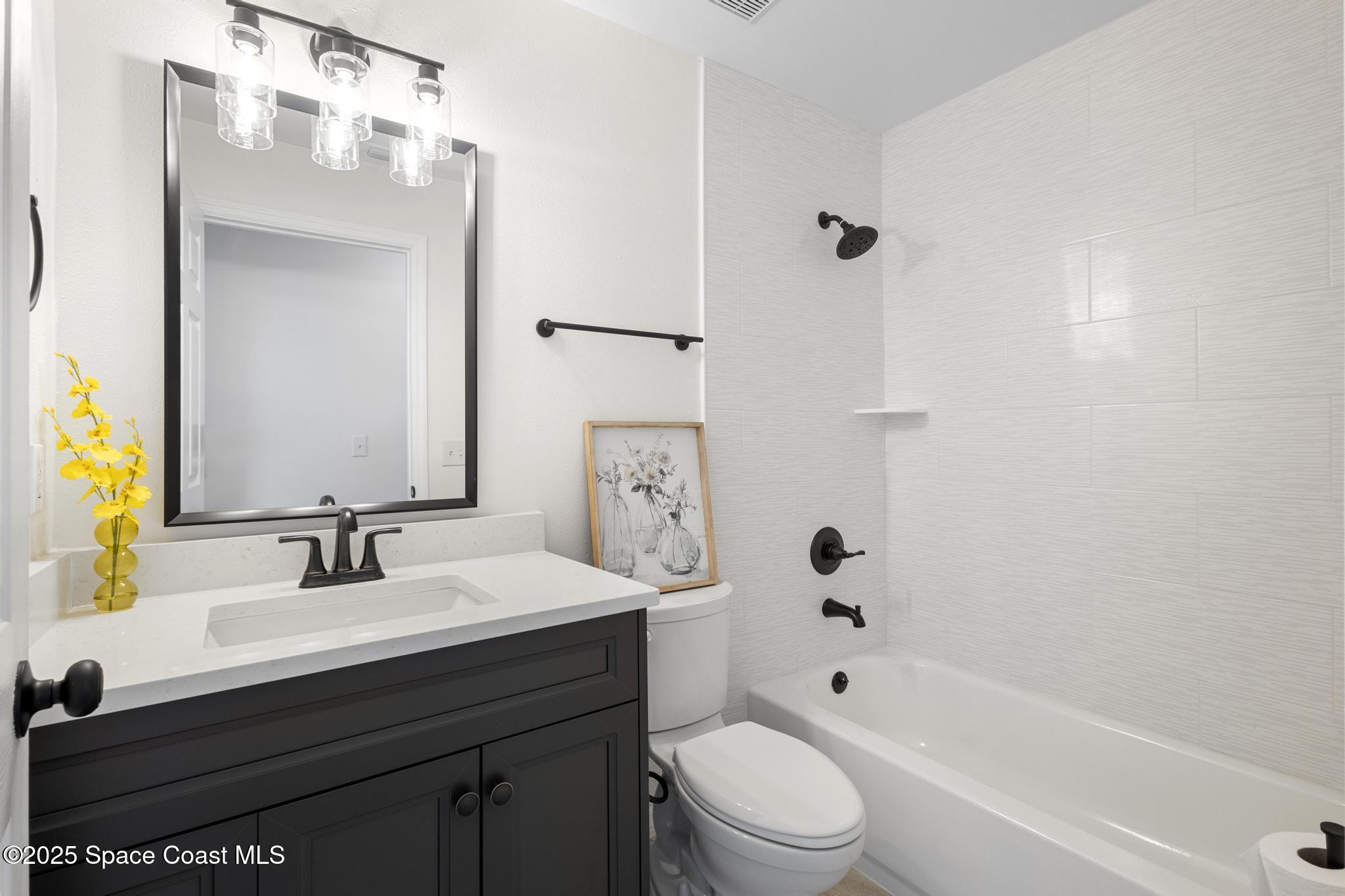 3475 Saddle Brook Drive Melbourne, FL 32934 - Photo 14 of 21 2nd bathroom