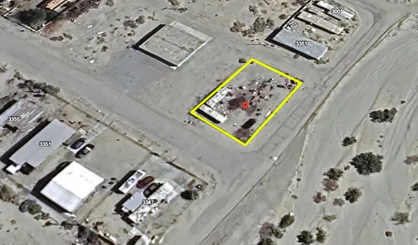 an aerial view of a house with a bed