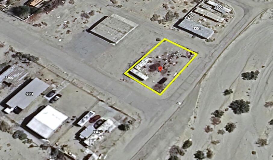 an aerial view of a house with a bed