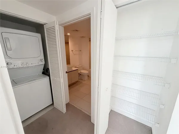 a spacious bathroom with a bathtub and a shower