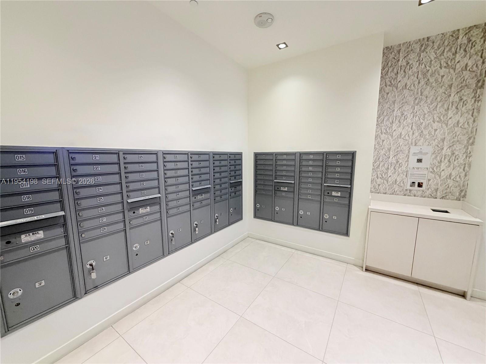 4250 Biscayne Boulevard, Unit 1014 Miami, FL 33137 - Photo 21 of 63 a view of a kitchen with white cabinets