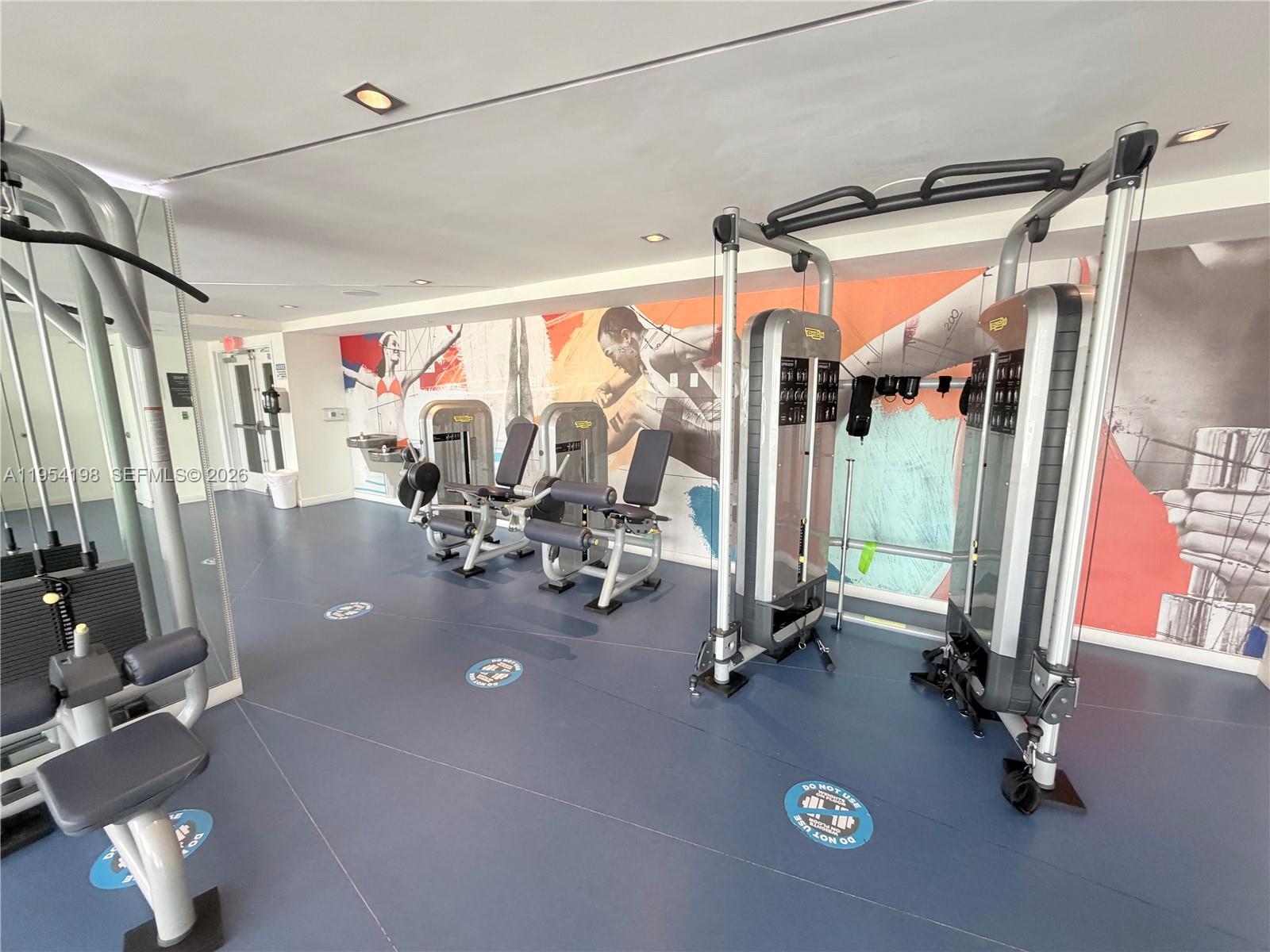 4250 Biscayne Boulevard, Unit 1014 Miami, FL 33137 - Photo 32 of 63 a view of a room with gym equipment