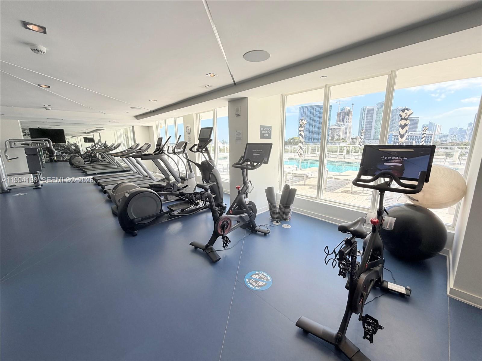 4250 Biscayne Boulevard, Unit 1014 Miami, FL 33137 - Photo 35 of 63 a view of a room with gym equipment