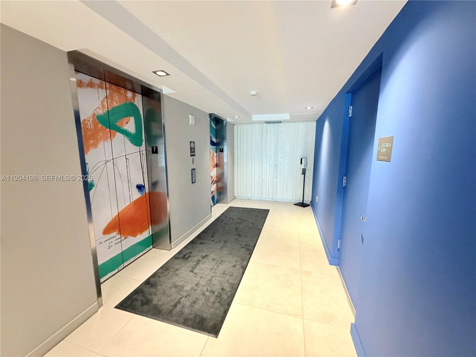 4250 Biscayne Boulevard, Unit 1014 Miami, FL 33137 - Photo 40 of 63 a view of hallway with stairs