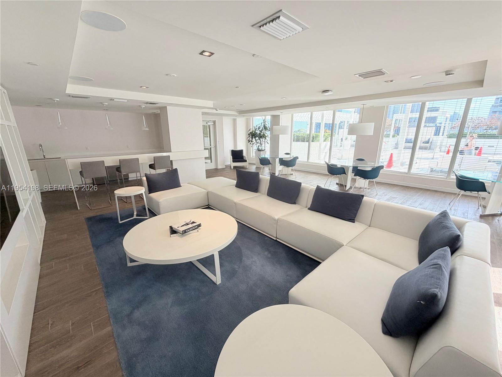 4250 Biscayne Boulevard, Unit 1014 Miami, FL 33137 - Photo 44 of 63 a living room with furniture and a large window