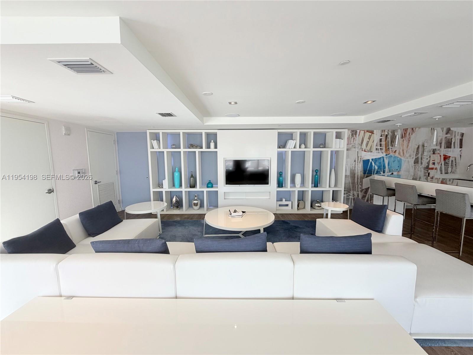 4250 Biscayne Boulevard, Unit 1014 Miami, FL 33137 - Photo 46 of 63 a living room with furniture and a large window