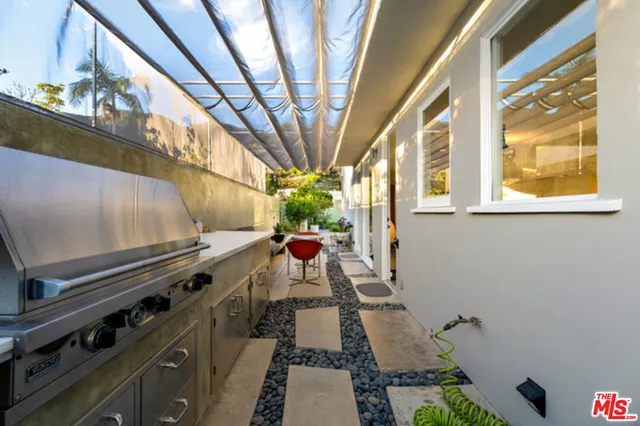 a bedroom with bed and window