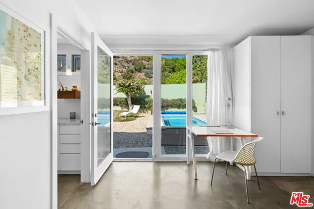 a bathroom with a sink double vanity and a mirror