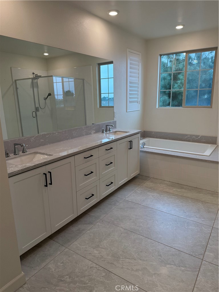 12358 Primrose Avenue Whittier, CA 90602 - Photo 14 of 50 a bathroom with a granite countertop sink mirror and a bathtub